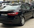 Чорний Кіа Ріо, об'ємом двигуна 1.4 л та пробігом 202 тис. км за 6900 $, фото 4 на Automoto.ua