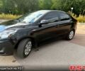 Черный Киа Рио, объемом двигателя 1.4 л и пробегом 74 тыс. км за 9100 $, фото 1 на Automoto.ua