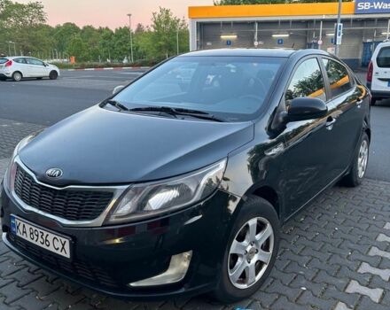Черный Киа Рио, объемом двигателя 1.4 л и пробегом 190 тыс. км за 6600 $, фото 2 на Automoto.ua
