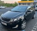 Черный Киа Рио, объемом двигателя 1.4 л и пробегом 190 тыс. км за 6600 $, фото 2 на Automoto.ua