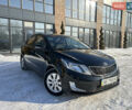 Черный Киа Рио, объемом двигателя 1.59 л и пробегом 93 тыс. км за 9350 $, фото 1 на Automoto.ua