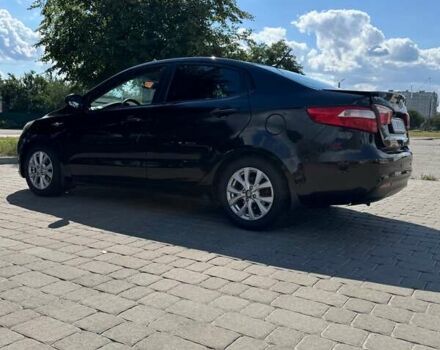 Чорний Кіа Ріо, об'ємом двигуна 1.4 л та пробігом 158 тис. км за 8300 $, фото 3 на Automoto.ua