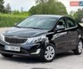 Чорний Кіа Ріо, об'ємом двигуна 1.4 л та пробігом 76 тис. км за 8850 $, фото 1 на Automoto.ua