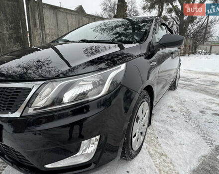 Черный Киа Рио, объемом двигателя 1.4 л и пробегом 155 тыс. км за 7500 $, фото 19 на Automoto.ua