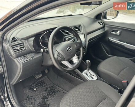 Черный Киа Рио, объемом двигателя 1.4 л и пробегом 155 тыс. км за 7500 $, фото 22 на Automoto.ua