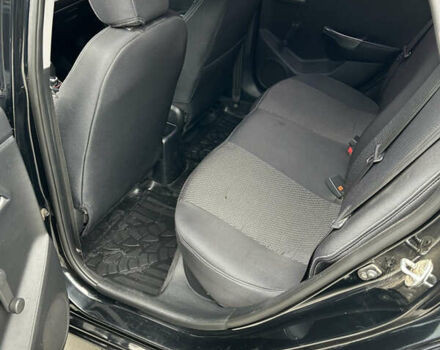 Черный Киа Рио, объемом двигателя 1.4 л и пробегом 111 тыс. км за 7500 $, фото 11 на Automoto.ua