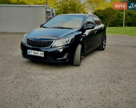 Чорний Кіа Ріо, об'ємом двигуна 1.4 л та пробігом 95 тис. км за 7300 $, фото 1 на Automoto.ua