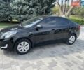 Чорний Кіа Ріо, об'ємом двигуна 1.6 л та пробігом 127 тис. км за 8300 $, фото 1 на Automoto.ua