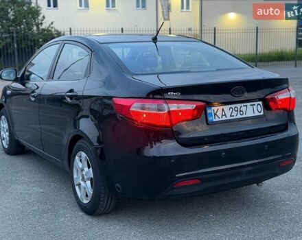 Чорний Кіа Ріо, об'ємом двигуна 1.4 л та пробігом 201 тис. км за 6950 $, фото 2 на Automoto.ua