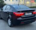 Чорний Кіа Ріо, об'ємом двигуна 1.4 л та пробігом 201 тис. км за 6950 $, фото 2 на Automoto.ua