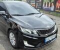 Чорний Кіа Ріо, об'ємом двигуна 1.59 л та пробігом 127 тис. км за 8800 $, фото 1 на Automoto.ua