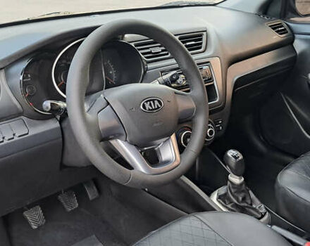 Чорний Кіа Ріо, об'ємом двигуна 1.4 л та пробігом 89 тис. км за 6800 $, фото 7 на Automoto.ua