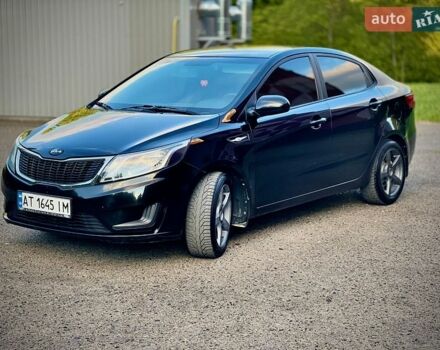 Чорний Кіа Ріо, об'ємом двигуна 1.4 л та пробігом 95 тис. км за 7300 $, фото 4 на Automoto.ua