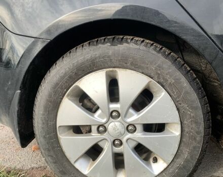 Чорний Кіа Ріо, об'ємом двигуна 1.4 л та пробігом 190 тис. км за 5500 $, фото 19 на Automoto.ua