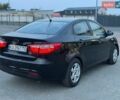 Чорний Кіа Ріо, об'ємом двигуна 1.4 л та пробігом 201 тис. км за 6950 $, фото 4 на Automoto.ua