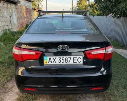 Чорний Кіа Ріо, об'ємом двигуна 1.4 л та пробігом 73 тис. км за 8900 $, фото 6 на Automoto.ua