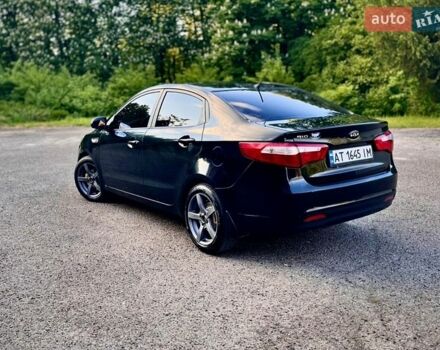 Чорний Кіа Ріо, об'ємом двигуна 1.4 л та пробігом 95 тис. км за 7300 $, фото 7 на Automoto.ua