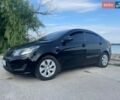 Чорний Кіа Ріо, об'ємом двигуна 1.4 л та пробігом 178 тис. км за 7800 $, фото 1 на Automoto.ua