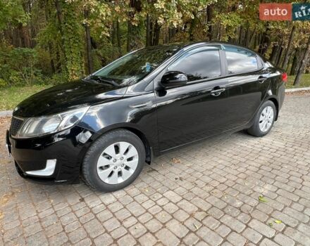 Черный Киа Рио, объемом двигателя 1.59 л и пробегом 160 тыс. км за 8100 $, фото 1 на Automoto.ua