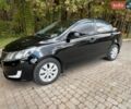 Черный Киа Рио, объемом двигателя 1.59 л и пробегом 160 тыс. км за 8100 $, фото 1 на Automoto.ua