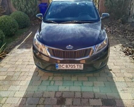 Чорний Кіа Ріо, об'ємом двигуна 1.4 л та пробігом 95 тис. км за 7000 $, фото 1 на Automoto.ua