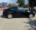 Чорний Кіа Ріо, об'ємом двигуна 1.4 л та пробігом 158 тис. км за 8300 $, фото 6 на Automoto.ua