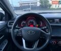 Чорний Кіа Ріо, об'ємом двигуна 1.4 л та пробігом 201 тис. км за 6950 $, фото 18 на Automoto.ua