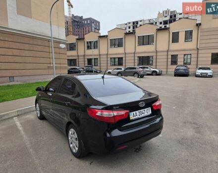 Чорний Кіа Ріо, об'ємом двигуна 1.6 л та пробігом 215 тис. км за 7500 $, фото 1 на Automoto.ua