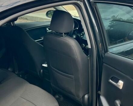Черный Киа Рио, объемом двигателя 1.4 л и пробегом 199 тыс. км за 8600 $, фото 7 на Automoto.ua