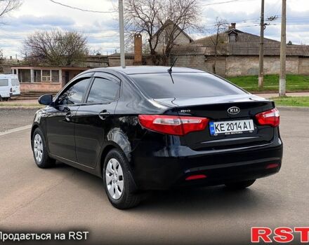 Чорний Кіа Ріо, об'ємом двигуна 1.4 л та пробігом 170 тис. км за 7800 $, фото 3 на Automoto.ua