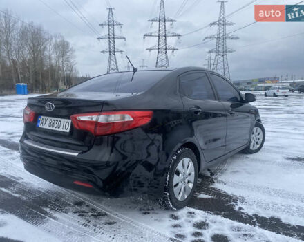 Черный Киа Рио, объемом двигателя 1.59 л и пробегом 249 тыс. км за 6900 $, фото 4 на Automoto.ua