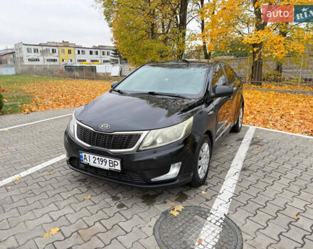 Чорний Кіа Ріо, об'ємом двигуна 1.6 л та пробігом 392 тис. км за 4500 $, фото 12 на Automoto.ua