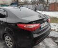 Чорний Кіа Ріо, об'ємом двигуна 1.4 л та пробігом 92 тис. км за 7200 $, фото 9 на Automoto.ua