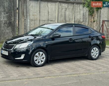Черный Киа Рио, объемом двигателя 1.4 л и пробегом 155 тыс. км за 7500 $, фото 1 на Automoto.ua