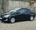 Черный Киа Рио, объемом двигателя 1.4 л и пробегом 155 тыс. км за 7500 $, фото 1 на Automoto.ua