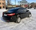 Чорний Кіа Ріо, об'ємом двигуна 1.6 л та пробігом 270 тис. км за 6499 $, фото 5 на Automoto.ua
