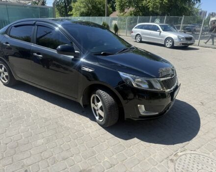 Черный Киа Рио, объемом двигателя 1.6 л и пробегом 330 тыс. км за 5500 $, фото 3 на Automoto.ua