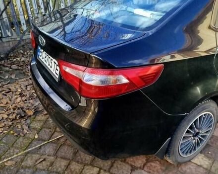 Чорний Кіа Ріо, об'ємом двигуна 1.4 л та пробігом 95 тис. км за 7000 $, фото 3 на Automoto.ua