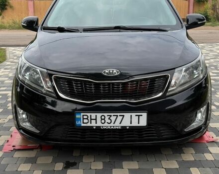 Чорний Кіа Ріо, об'ємом двигуна 1.6 л та пробігом 104 тис. км за 8500 $, фото 17 на Automoto.ua