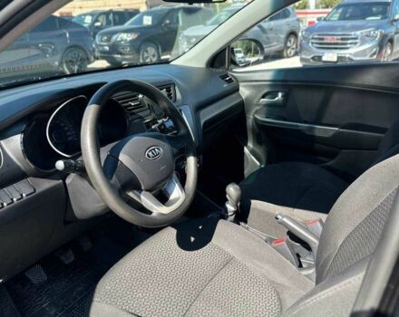 Чорний Кіа Ріо, об'ємом двигуна 1.4 л та пробігом 53 тис. км за 8933 $, фото 6 на Automoto.ua