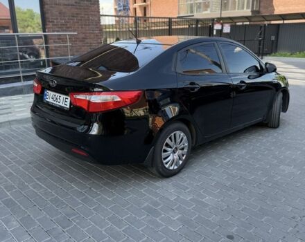 Чорний Кіа Ріо, об'ємом двигуна 1.4 л та пробігом 103 тис. км за 7999 $, фото 3 на Automoto.ua