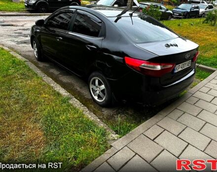 Черный Киа Рио, объемом двигателя 1.6 л и пробегом 330 тыс. км за 5700 $, фото 4 на Automoto.ua