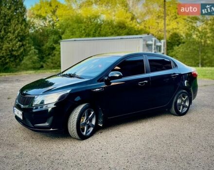 Чорний Кіа Ріо, об'ємом двигуна 1.4 л та пробігом 95 тис. км за 7300 $, фото 5 на Automoto.ua