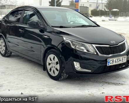 Черный Киа Рио, объемом двигателя 1.4 л и пробегом 155 тыс. км за 7500 $, фото 1 на Automoto.ua