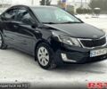 Черный Киа Рио, объемом двигателя 1.4 л и пробегом 155 тыс. км за 7500 $, фото 1 на Automoto.ua
