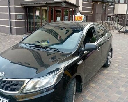 Чорний Кіа Ріо, об'ємом двигуна 1.4 л та пробігом 162 тис. км за 7500 $, фото 8 на Automoto.ua