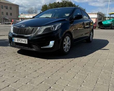 Чорний Кіа Ріо, об'ємом двигуна 1.4 л та пробігом 158 тис. км за 8300 $, фото 1 на Automoto.ua