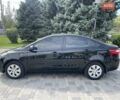 Чорний Кіа Ріо, об'ємом двигуна 1.6 л та пробігом 127 тис. км за 8300 $, фото 4 на Automoto.ua
