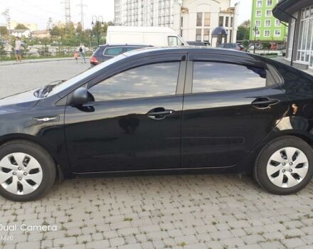 Чорний Кіа Ріо, об'ємом двигуна 1.4 л та пробігом 80 тис. км за 8700 $, фото 5 на Automoto.ua