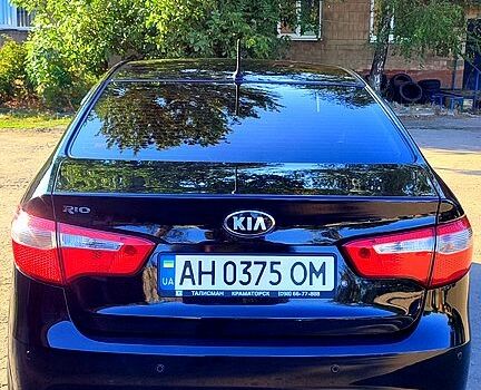 Черный Киа Рио, объемом двигателя 1.4 л и пробегом 120 тыс. км за 7700 $, фото 3 на Automoto.ua